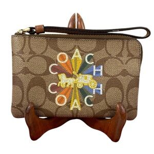 Coach EUC Rainbow Radial Print Khaki and Tan Pride Small Corner Zip Wristlet